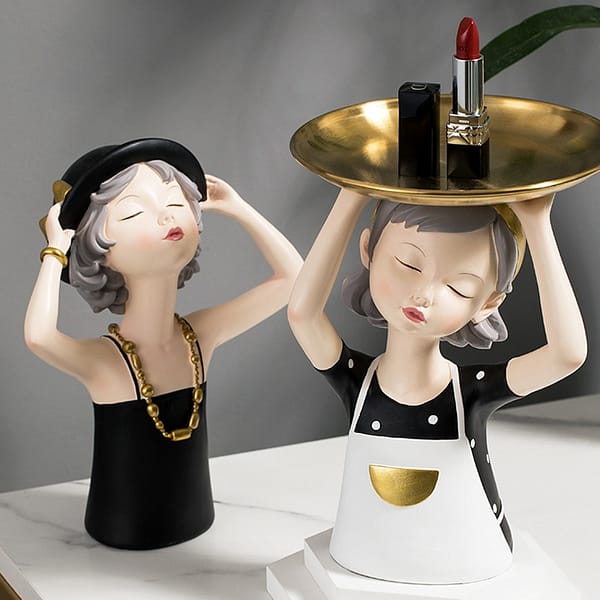 summer girls home display decoration girl with black hat and colored necklace looking up to the sun and girl with tray and apron